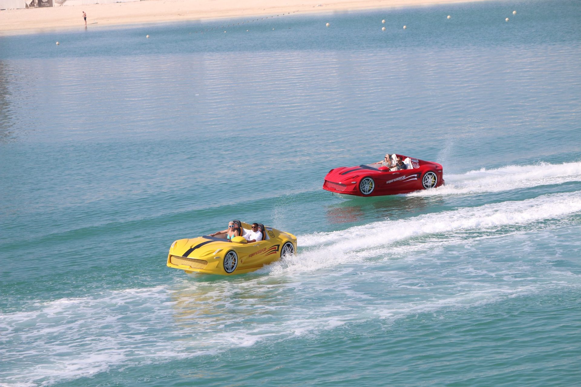 Super Water Car yellow jet car watercraft at speed in Dubai UAE